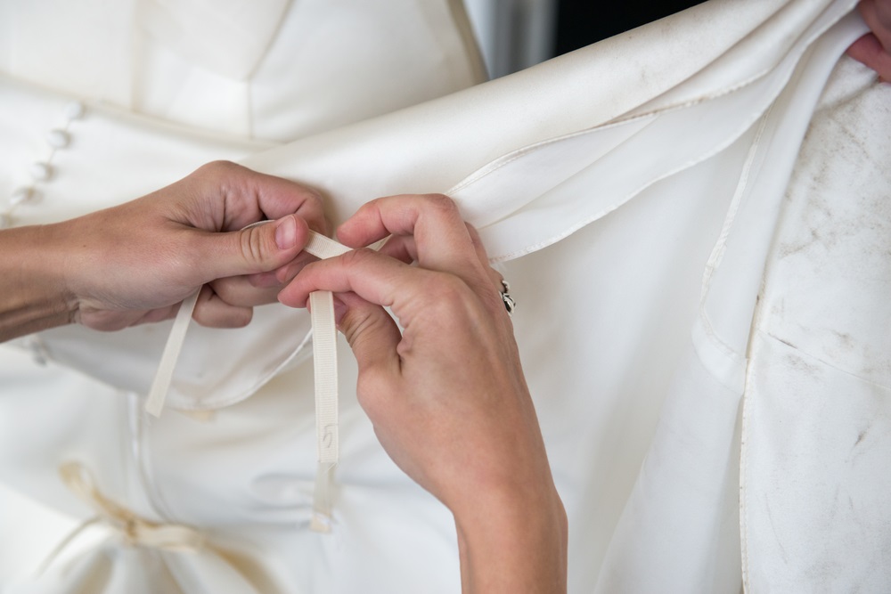 Instructions on how to make a bustle on a wedding dress for a perfect bridal look.