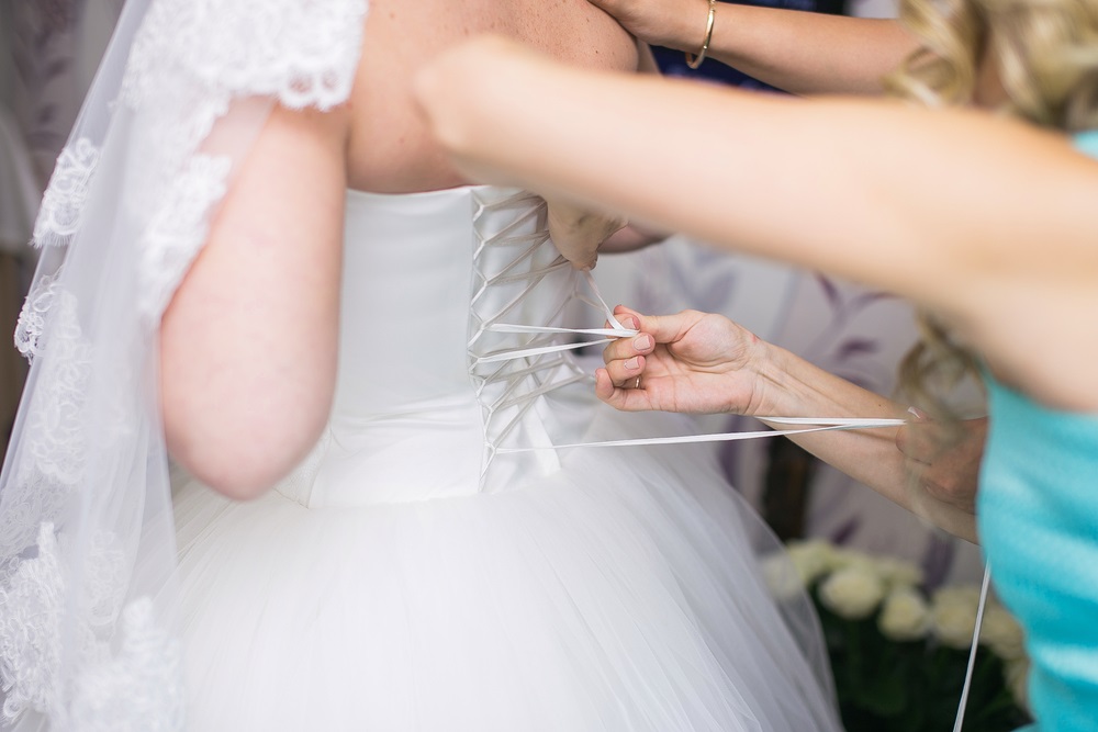 Instructions on how to make a bustle on a wedding dress for a perfect bridal look.