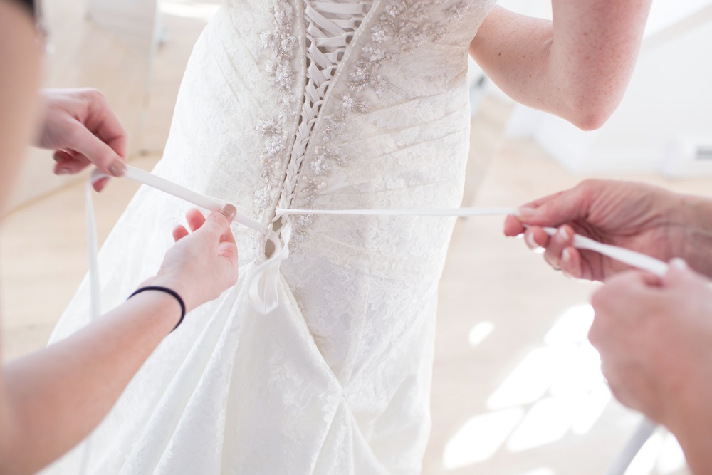 Instructions on how to make a bustle on a wedding dress for a perfect bridal look.